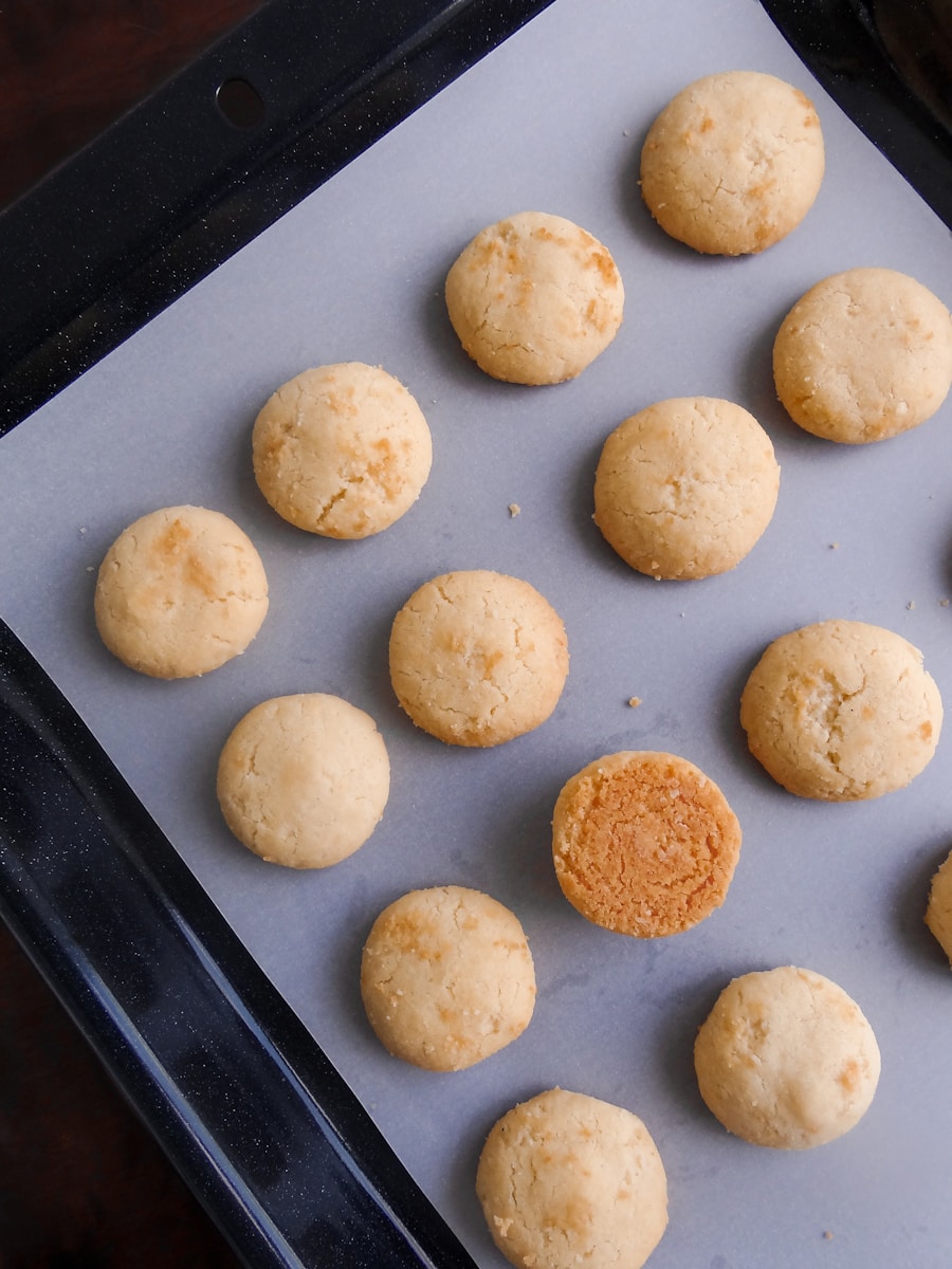 A baking tray filled with a batch of cookies